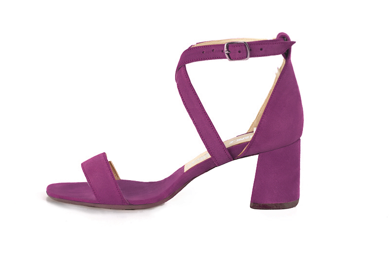Women's  elegant sandals closed at the back with crossed straps. .  - Profile view